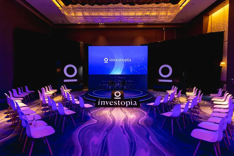 Investopia conference stage and branded event environment