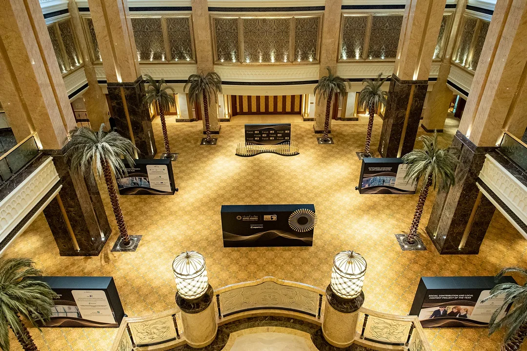 ADIPEC Awards 2022 branded event environment and guest reception setup