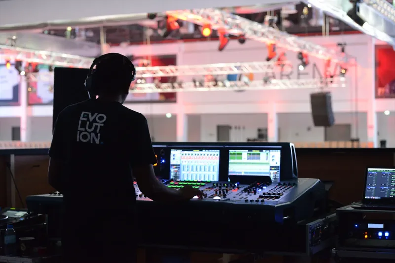 Evolution Events audio engineer managing live sound production