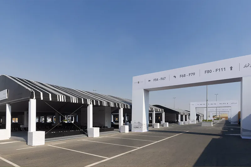 Temporary event parking and transport infrastructure for large-scale site operations