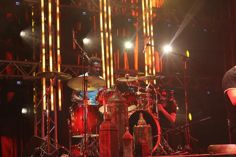 Live drummer performing on a professionally produced event stage