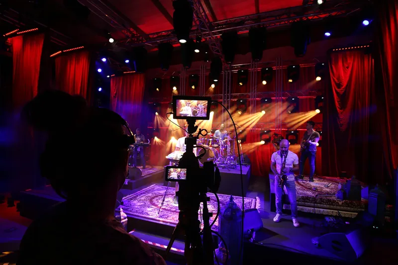 Live band performance with professional stage lighting and event production
