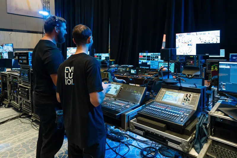 Evolution Events technical team managing live audio production for ENACT Majlis