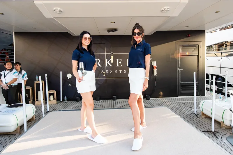 Event hostesses welcoming guests at a corporate event