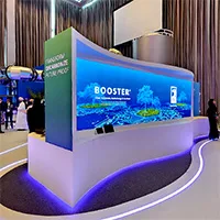 Interactive exhibition stand with immersive digital display and custom branded environment