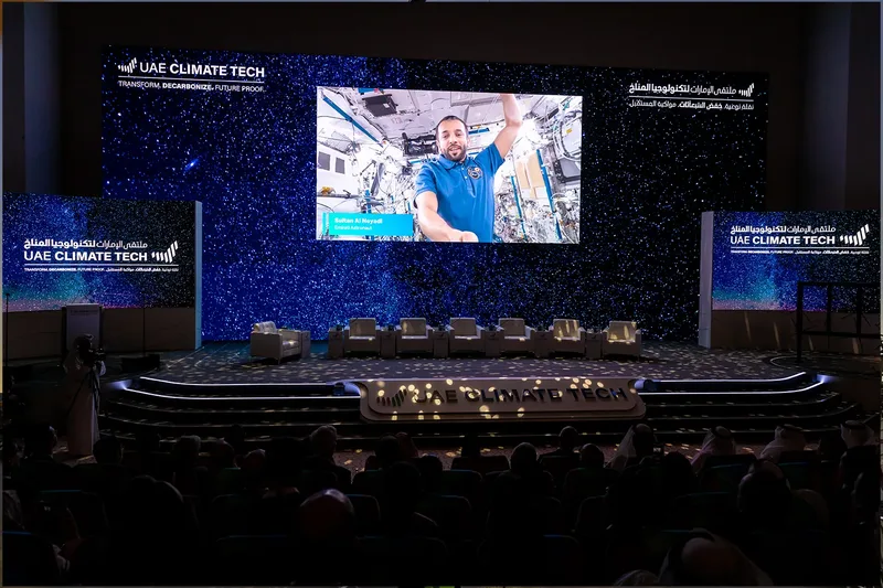 UAE Climate Tech conference stage with large LED screen and live event production