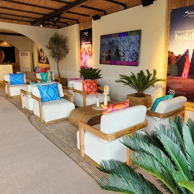 Premium experiential retail lounge with custom furniture and branded styling