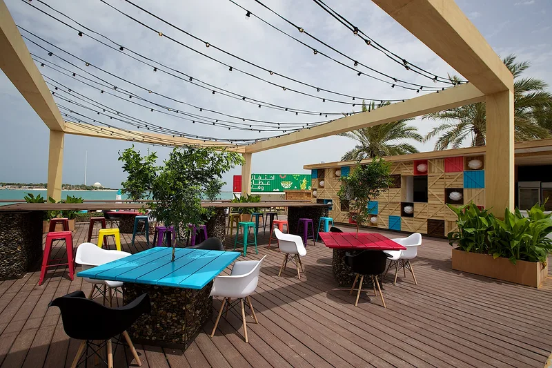 Shaded outdoor dining and activity area at Mother of the Nation Festival Abu Dhabi