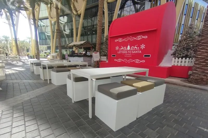 Custom branded hospitality activation with outdoor guest seating