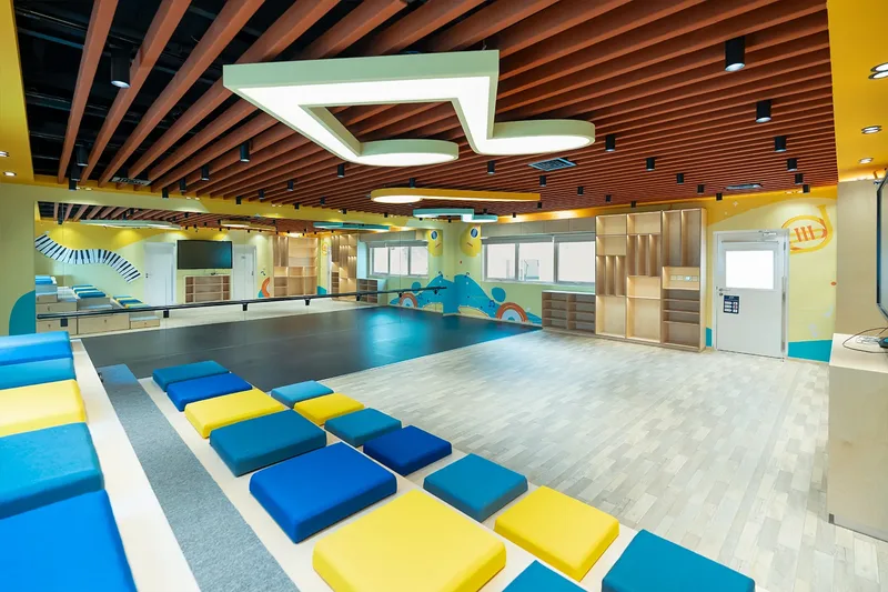 Custom interactive event space with colourful seating and branded interior design