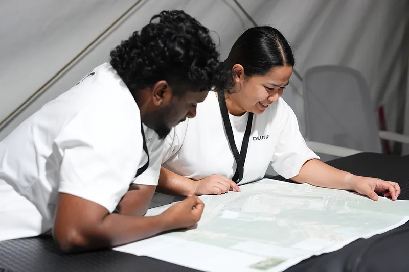 Evolution Events team reviewing site plans for government event delivery