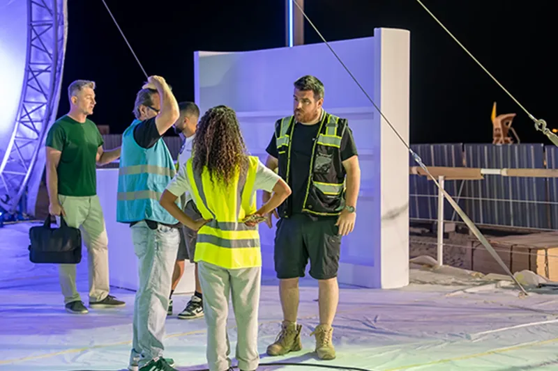 Event production team managing live site installation and technical delivery