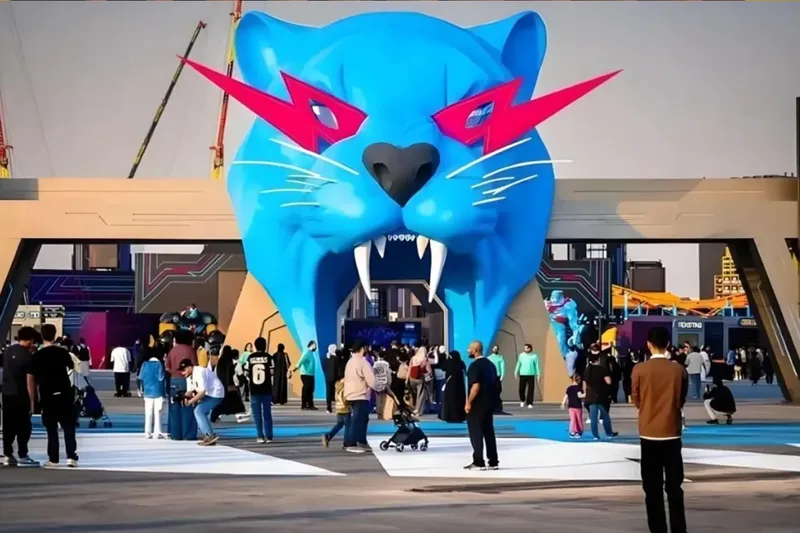 Large-scale branded entrance installation for a public event experience