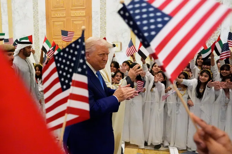 US President Donald Trump at the USA Presidential Reception in Abu Dhabi with UAE and US flags